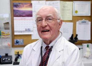 "Eighty-year-old practicing physician Dr. Jack Lewis poses for a photo in his office in Omaha, Neb., Thursday, June 4, 2015." (AP Photo/Nati Harnik) 